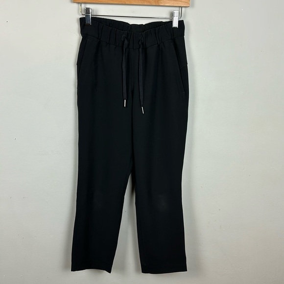 Lululemon On The Fly Crop *Woven 23" Black Sz 2 - Picture 6 of 12